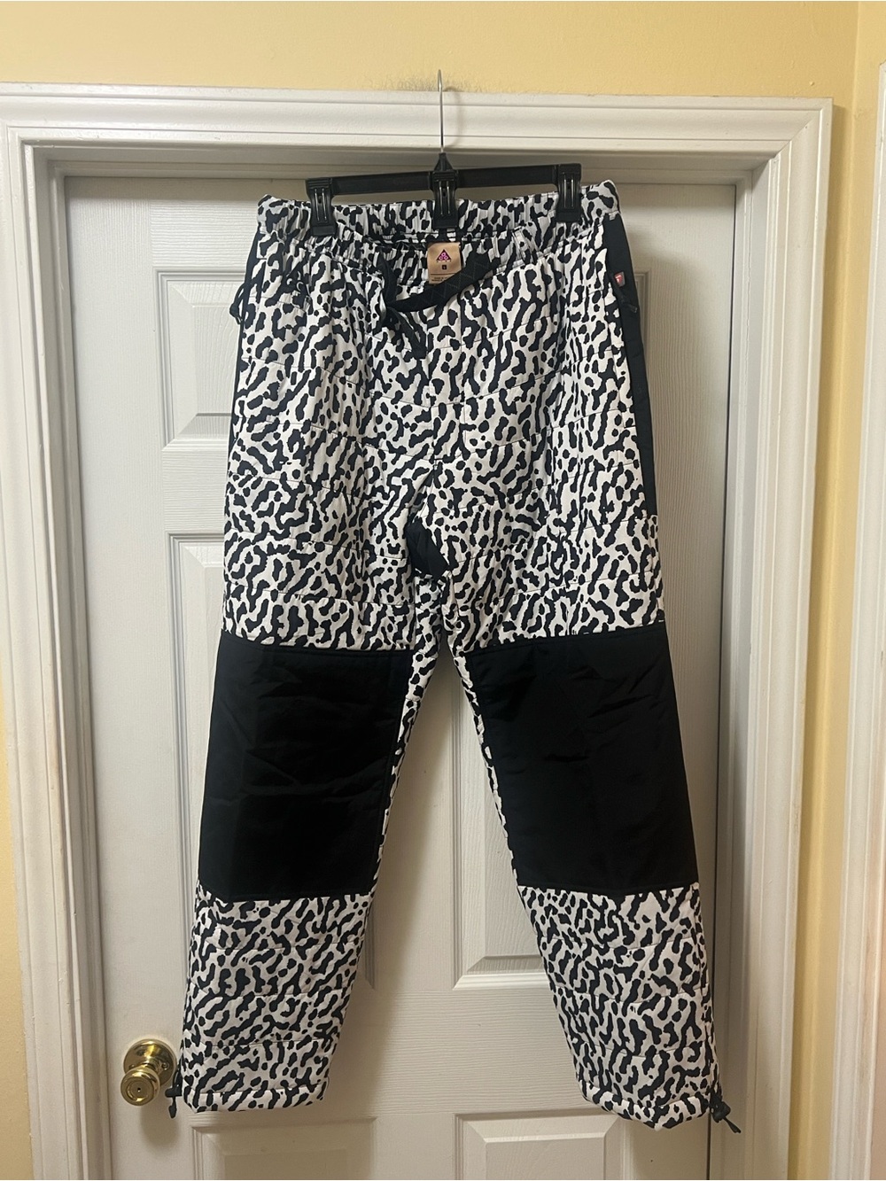 Nike ACG Black and White Leopard-Print Joggers with Contrasting Knee Panels